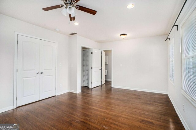 unfurnished bedroom with baseboards, recessed lighting, wood finished floors, and visible vents