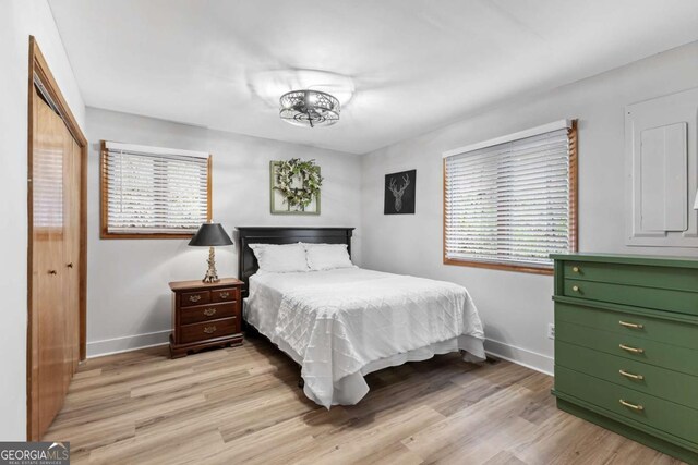 49 Baum Weg, Helen, GA 30545 - bedroom with a closet, baseboards, and light wood-type flooring