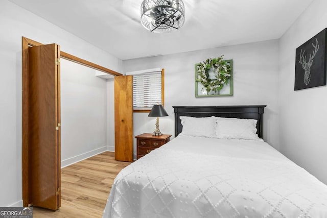 49 Baum Weg, Helen, GA 30545 - bedroom with baseboards, a closet, and wood finished floors