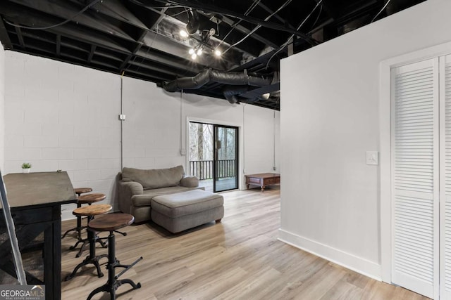 49 Baum Weg, Helen, GA 30545 - basement featuring baseboards, light wood finished floors, and concrete block wall