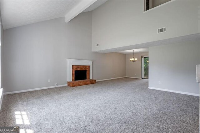 785 Redland Dr, Jonesboro, GA 30238 - unfurnished living room with high vaulted ceiling, a chandelier, carpet, a fireplace, and beam ceiling