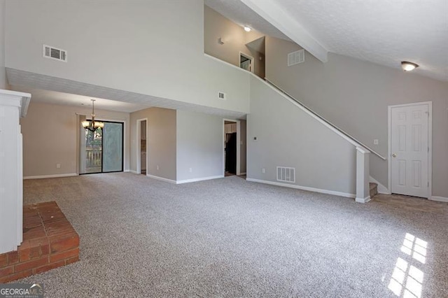 785 Redland Dr, Jonesboro, GA 30238 - unfurnished living room featuring carpet flooring, a chandelier, high vaulted ceiling, stairs, and beamed ceiling