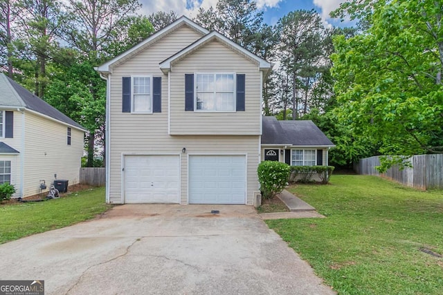 2319 Rambling Way, Lithonia, GA 30058 - view of front of property with a garage and concrete driveway