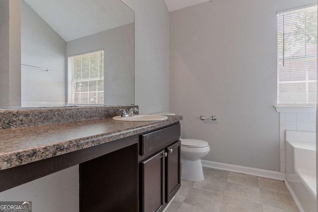 2319 Rambling Way, Lithonia, GA 30058 - full bathroom with a garden tub, vanity, lofted ceiling, and tile patterned flooring