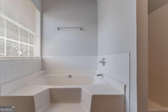 2319 Rambling Way, Lithonia, GA 30058 - bathroom featuring a garden tub