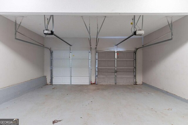 2319 Rambling Way, Lithonia, GA 30058 - garage with a garage door opener