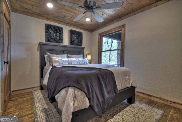 bedroom with hardwood / wood-style floors, baseboards, recessed lighting, wood ceiling, and a ceiling fan