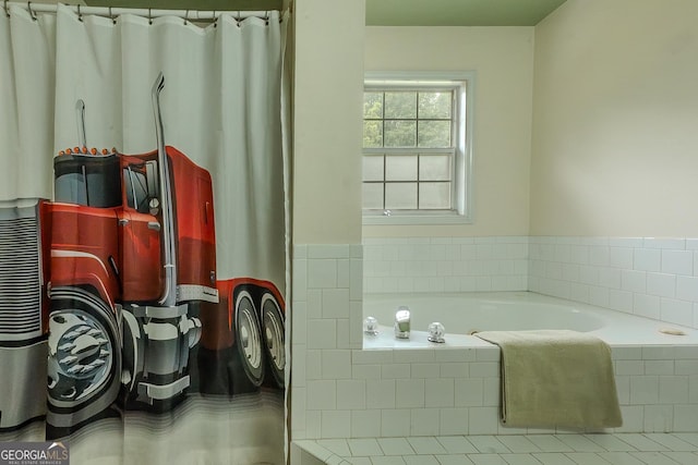 full bathroom featuring a garden tub and a shower with curtain