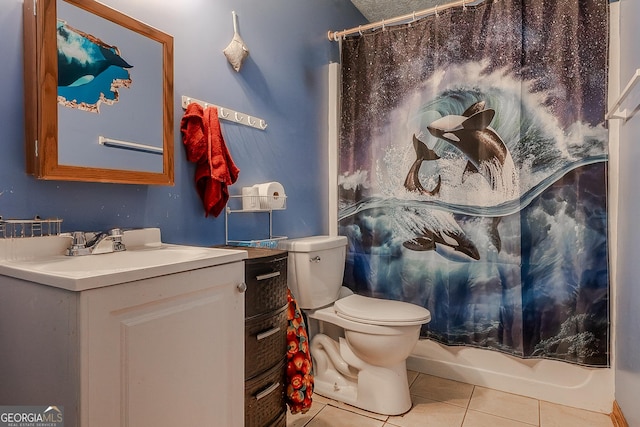 full bath featuring toilet, tile patterned floors, and vanity
