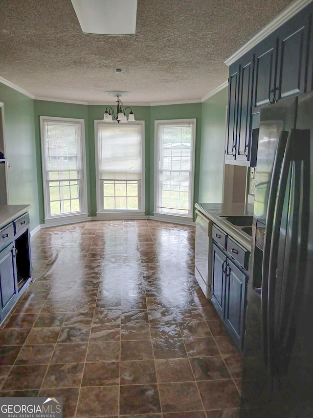 kitchen featuring stainless steel refrigerator with ice dispenser, a textured ceiling, crown molding, and dishwasher