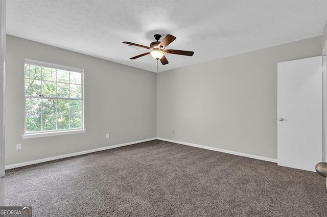 1774 Northwick Pl, Lithonia, GA 30058 - empty room featuring carpet flooring, ceiling fan, and baseboards