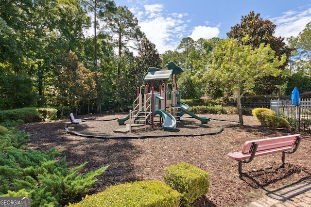 community jungle gym with fence