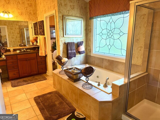 full bath with vanity, a tub with jets, wallpapered walls, tile patterned floors, and a shower stall