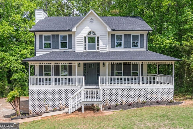 5139 Coolamber Dr, Powder Springs, GA 30127 - colonial house featuring roof with shingles, a chimney, and a porch