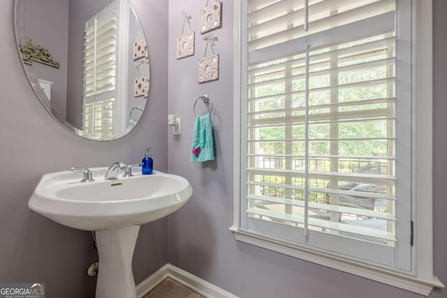 bathroom featuring baseboards