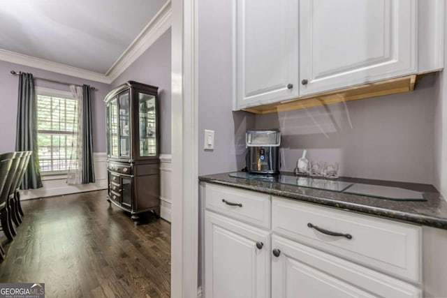 bar with crown molding and dark wood-type flooring