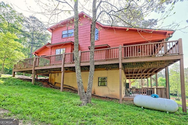 428 Gibbs Rd, Blairsville, GA 30512 - rear view of house with a deck and a lawn