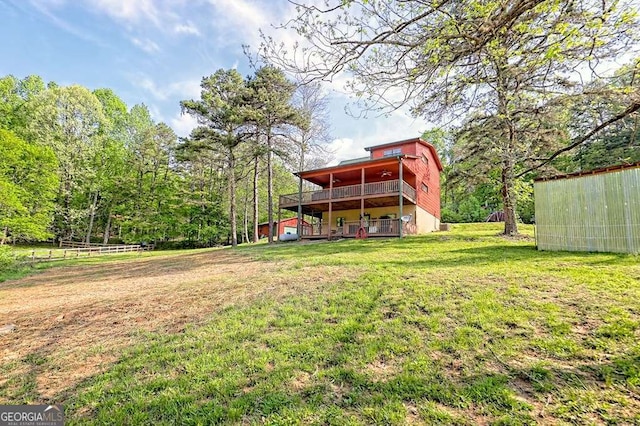 view of yard featuring a wooden deck