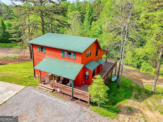 428 Gibbs Rd, Blairsville, GA 30512 - view of front of house with a wooded view, a metal roof, a standing seam roof, and a deck