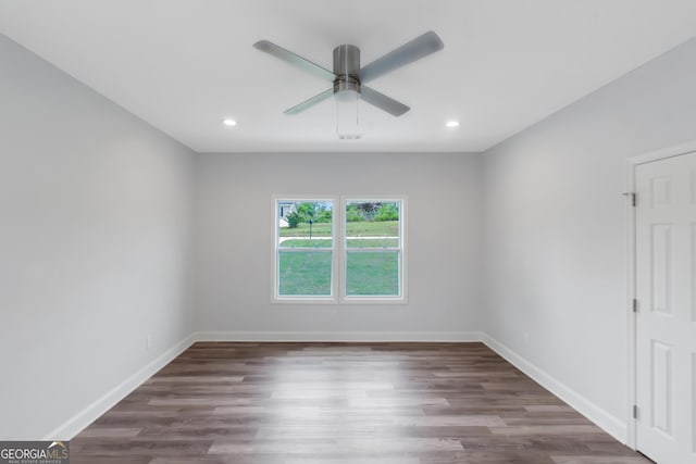 empty room with recessed lighting, baseboards, a ceiling fan, and wood finished floors