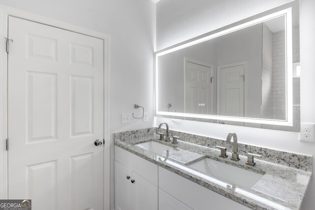 bathroom with double vanity