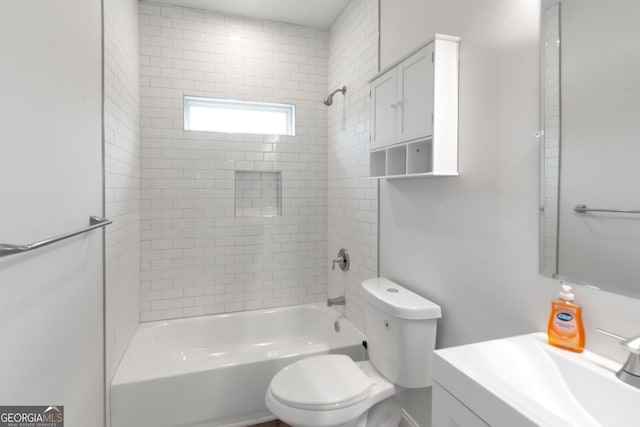 full bath featuring toilet, shower / bathtub combination, and vanity