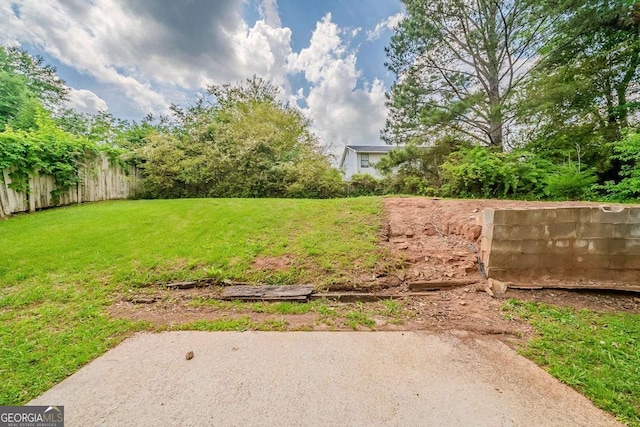 view of yard featuring fence
