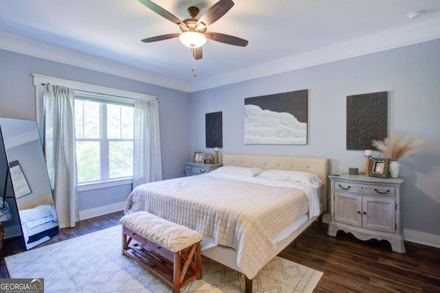 bedroom with crown molding, baseboards, ceiling fan, and dark wood-type flooring