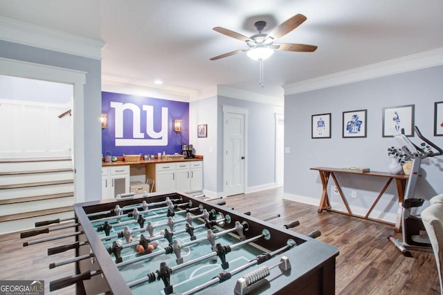 playroom with recessed lighting, ceiling fan, ornamental molding, and wood finished floors