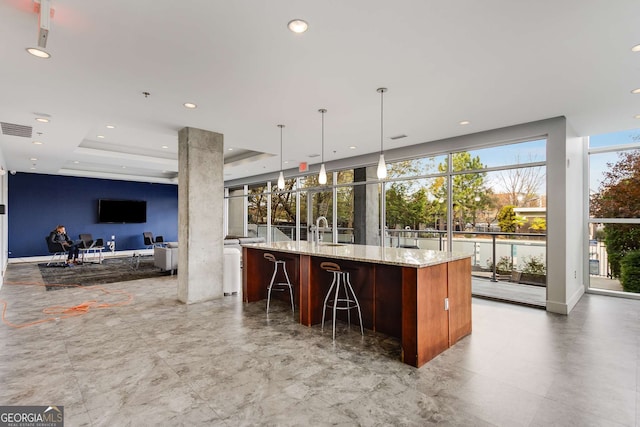 130 Arizona Ave NE Unit 104, Atlanta, GA 30307 - bar featuring a sink, hanging light fixtures, and recessed lighting