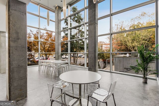 130 Arizona Ave NE Unit 104, Atlanta, GA 30307 - sunroom / solarium with outdoor dining area