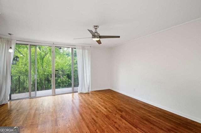 120 Alden Ave NW Unit C3, Atlanta, GA 30309 - spare room featuring baseboards, a ceiling fan, crown molding, and wood finished floors