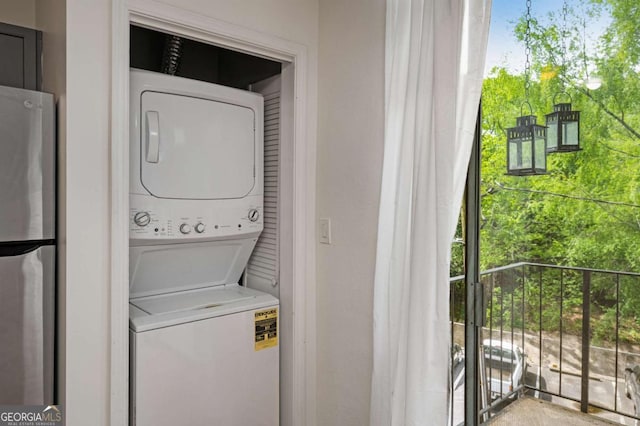 120 Alden Ave NW Unit C3, Atlanta, GA 30309 - laundry room with laundry area and stacked washer and clothes dryer