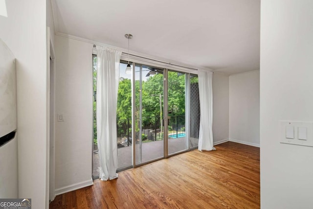 120 Alden Ave NW Unit C3, Atlanta, GA 30309 - empty room with baseboards and wood finished floors