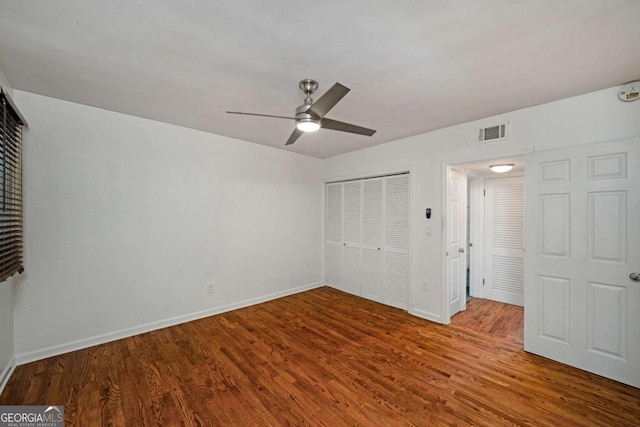 120 Alden Ave NW Unit C3, Atlanta, GA 30309 - unfurnished bedroom with visible vents, a closet, wood finished floors, baseboards, and ceiling fan