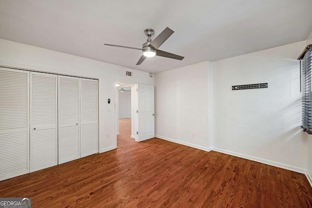 120 Alden Ave NW Unit C3, Atlanta, GA 30309 - unfurnished bedroom featuring baseboards, a closet, wood finished floors, and visible vents