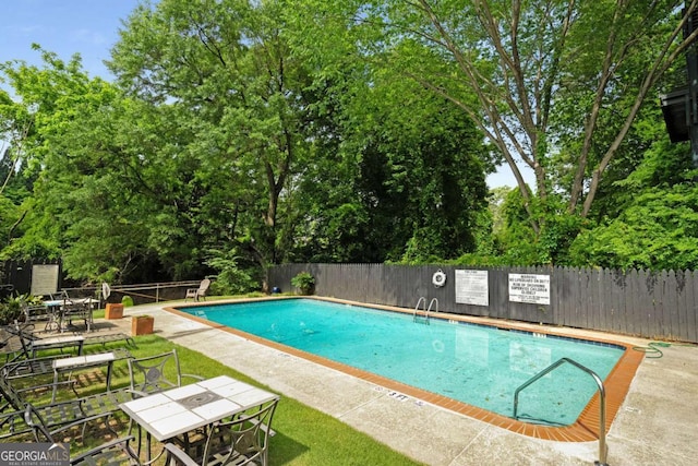 120 Alden Ave NW Unit C3, Atlanta, GA 30309 - pool featuring fence, outdoor dining space, and a patio area