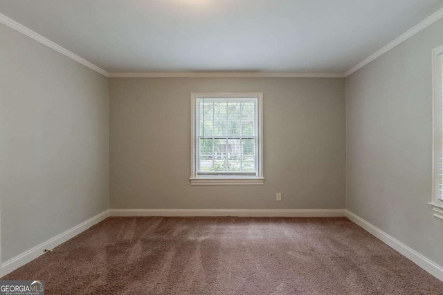 2465 Hogan Rd, Atlanta, GA 30344 - carpeted empty room featuring crown molding and baseboards