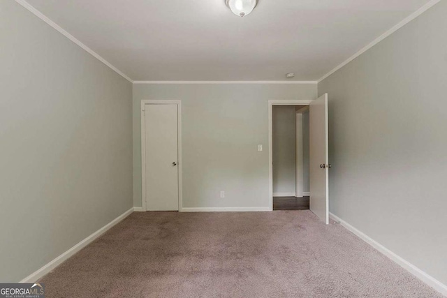 2465 Hogan Rd, Atlanta, GA 30344 - carpeted empty room with ornamental molding