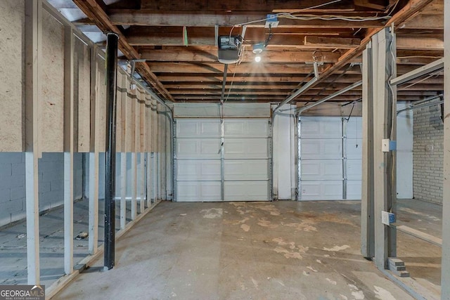 2465 Hogan Rd, Atlanta, GA 30344 - garage featuring a garage door opener