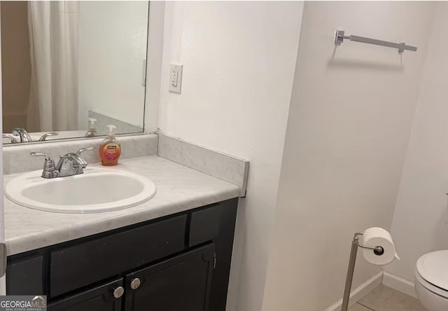 3796 Kensingwood Trce, Decatur, GA 30032 - bathroom with vanity, tile patterned flooring, and toilet