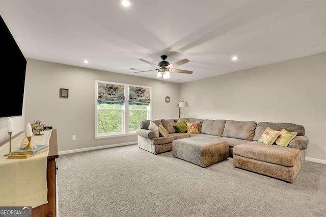 carpeted living area featuring baseboards, recessed lighting, and ceiling fan