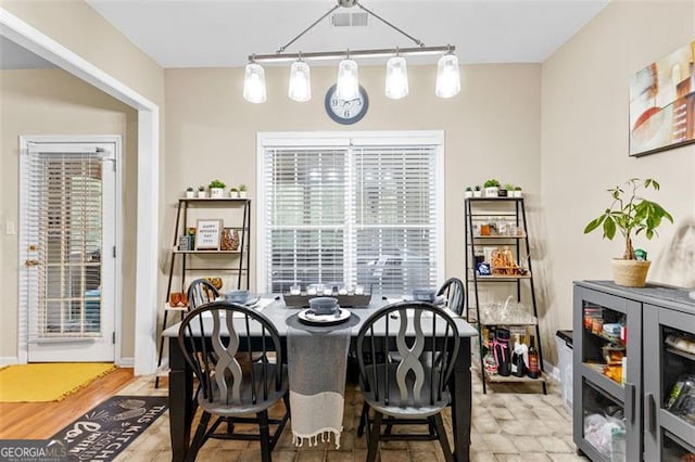 dining room with baseboards