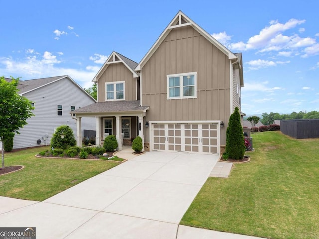 craftsman inspired home featuring board and batten siding, a garage, concrete driveway, and a front lawn