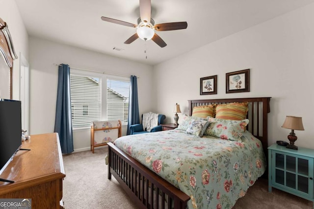 bedroom featuring baseboards, ceiling fan, carpet, and visible vents