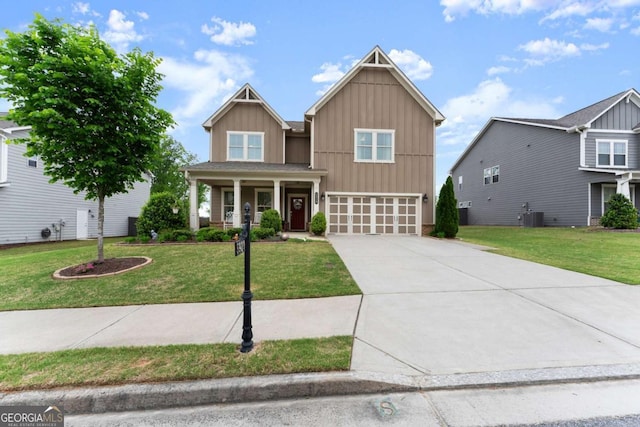 craftsman-style home with a front lawn, central AC, board and batten siding, concrete driveway, and an attached garage