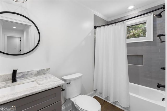 full bathroom with crown molding, vanity, wood finished floors, toilet, and shower / tub combo