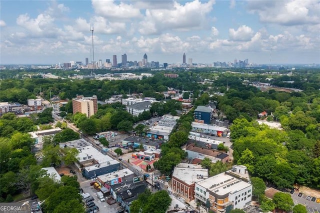 birds eye view of property featuring a city view