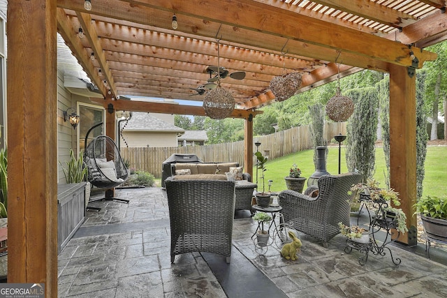 view of patio / terrace with a fenced backyard, ceiling fan, and a pergola