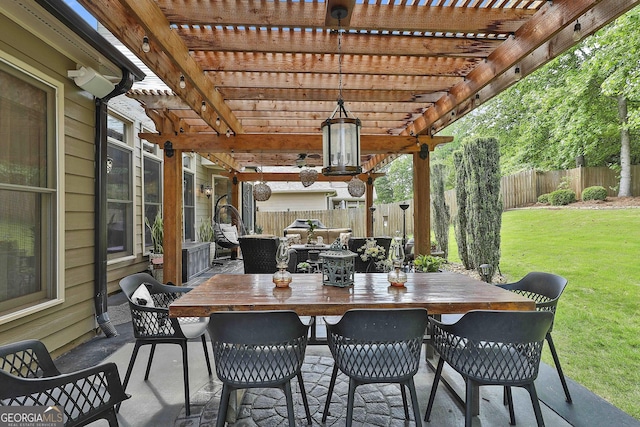 view of patio / terrace with a pergola and a fenced backyard